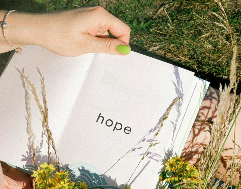 open book with the word hope