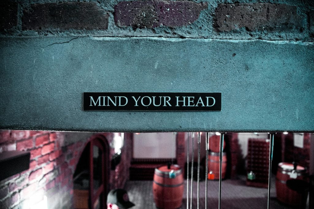 Mind your head sign on an entry way