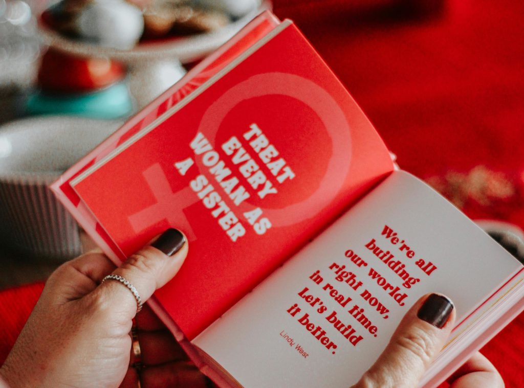 red book with Short Motivational Quote For Women